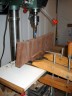 Drilling headrest for backbrace holes